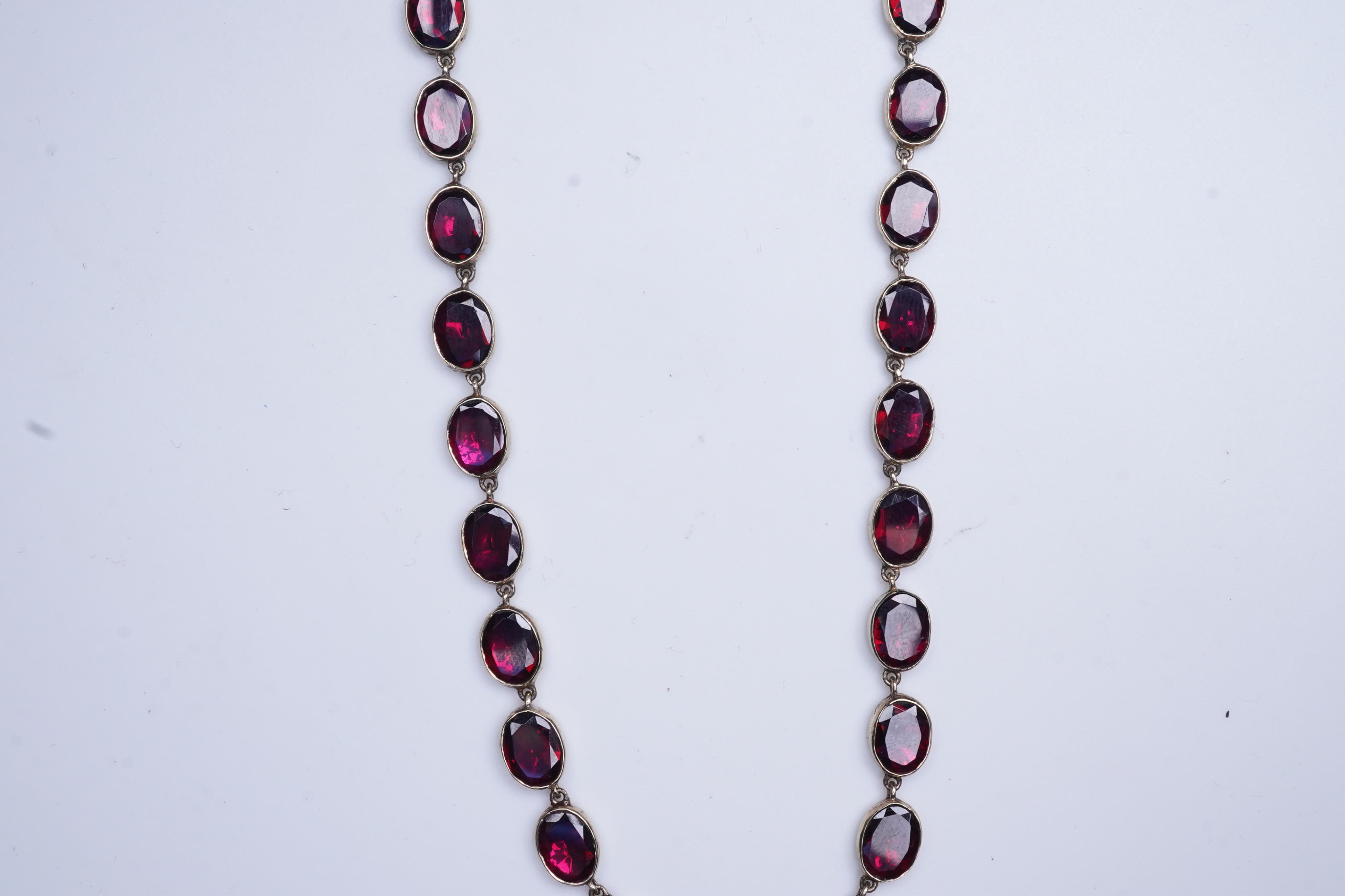 A garnet rivière necklace, circa 1970